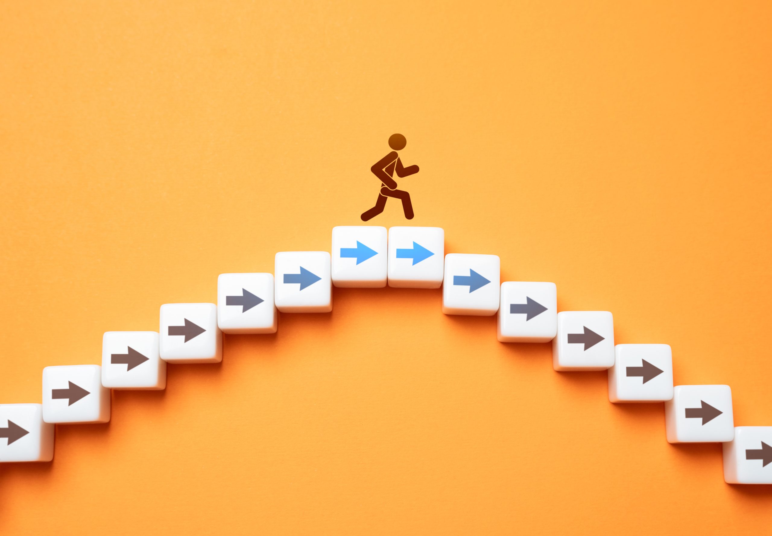 person crossing a hill of arrows signaling a career change