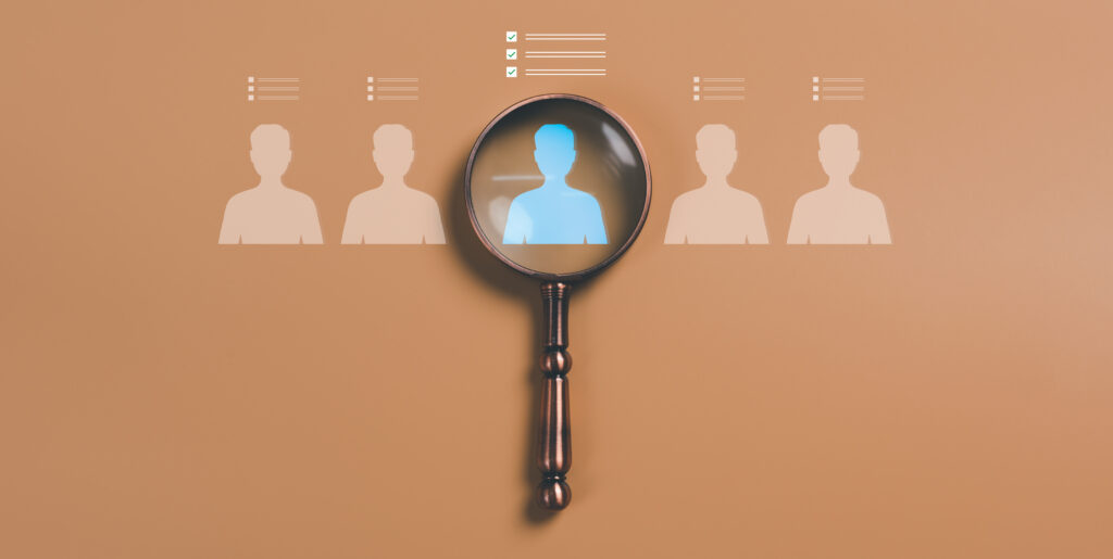 magnifying glass over people
